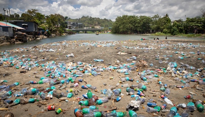 Discarded plastic water bottles line the shore of the Mataniko river in Honiara, stark 
evidence of the city’s constant search for clean water.​
CREDIT: Charlie Piringi, In-depth Solomons